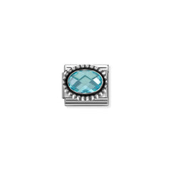 Nomination COMPOSABLE CLASSIC FACETTIERTE CZ Element aus Edelstahl, mit facettiertem CZ (oval) in 925er Silber Kugel-Fassung verziert (006_HIMMELBLAU)